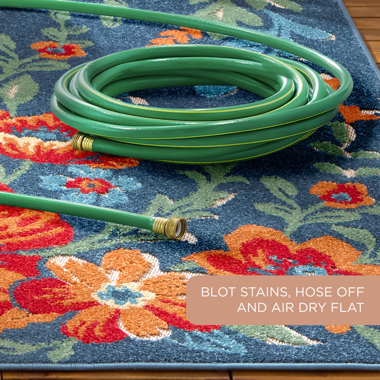 Hibiscus Bloom Blue and Red Floral Synthetic Area Rug