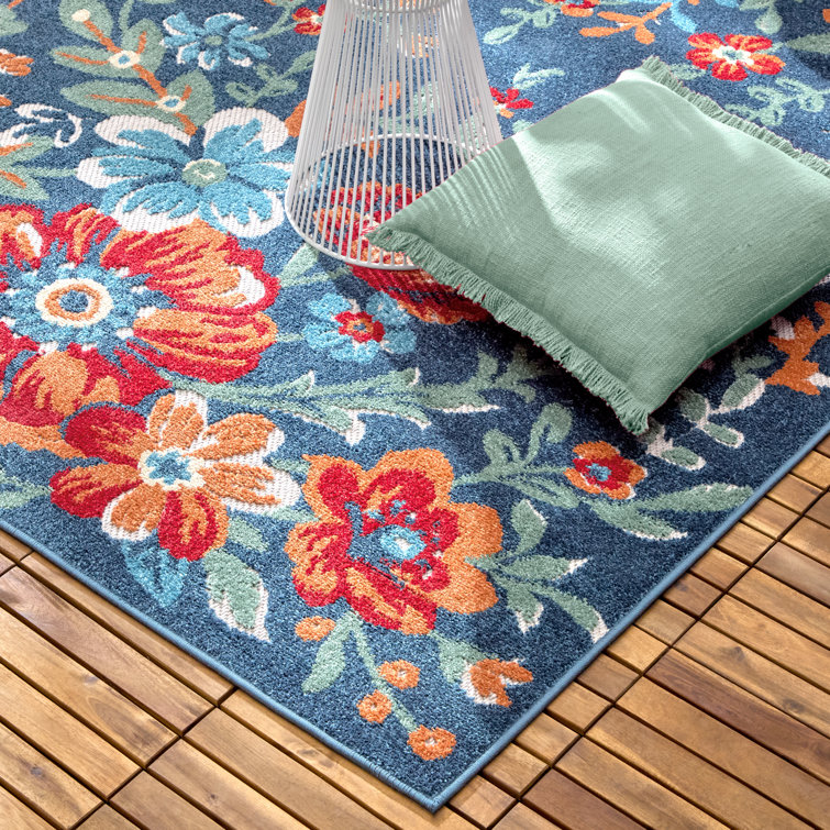 Hibiscus Bloom Blue and Red Floral Synthetic Area Rug