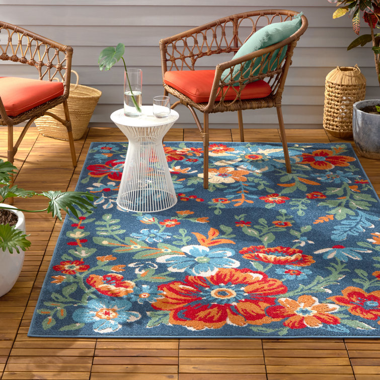 Hibiscus Bloom Blue and Red Floral Synthetic Area Rug