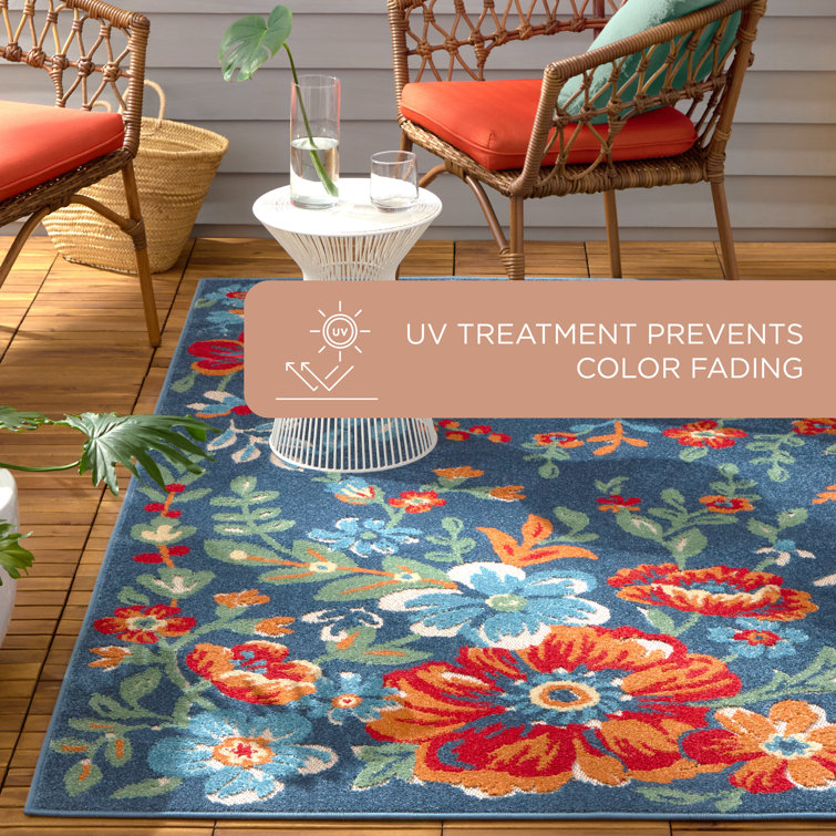 Hibiscus Bloom Blue and Red Floral Synthetic Area Rug