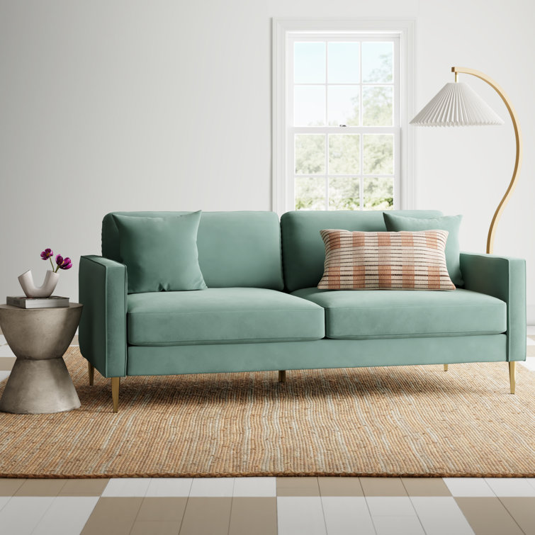 CosmoLiving Highland 66.9" Green Velvet Sofa with Tufted Back and Wood Accents
