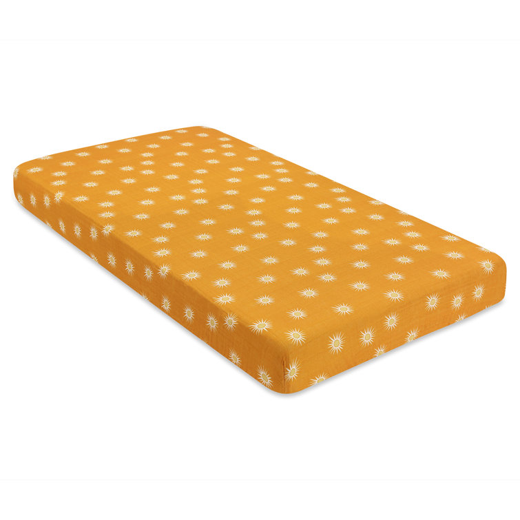 Golden Hour Organic Cotton Toddler Crib Sheet with Sunburst Pattern
