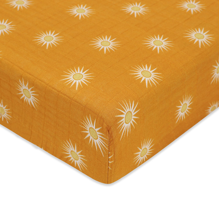 Golden Hour Organic Cotton Toddler Crib Sheet with Sunburst Pattern