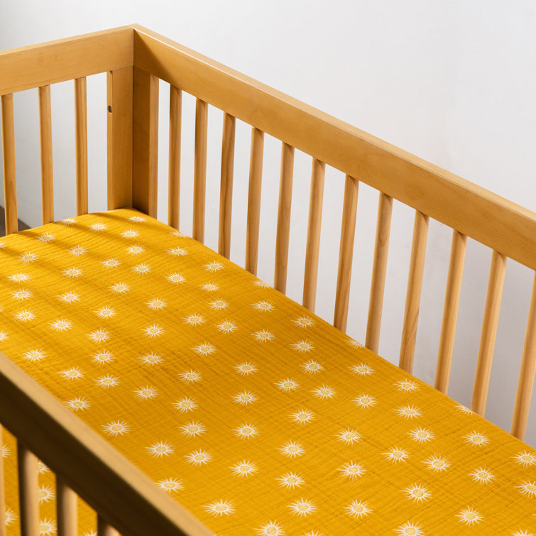 Golden Hour Organic Cotton Toddler Crib Sheet with Sunburst Pattern