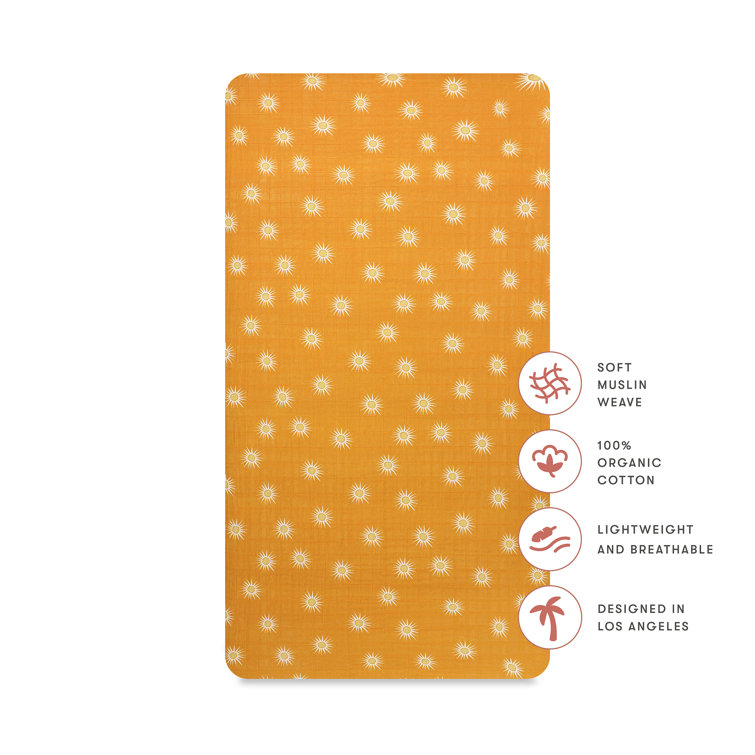 Golden Hour Organic Cotton Toddler Crib Sheet with Sunburst Pattern