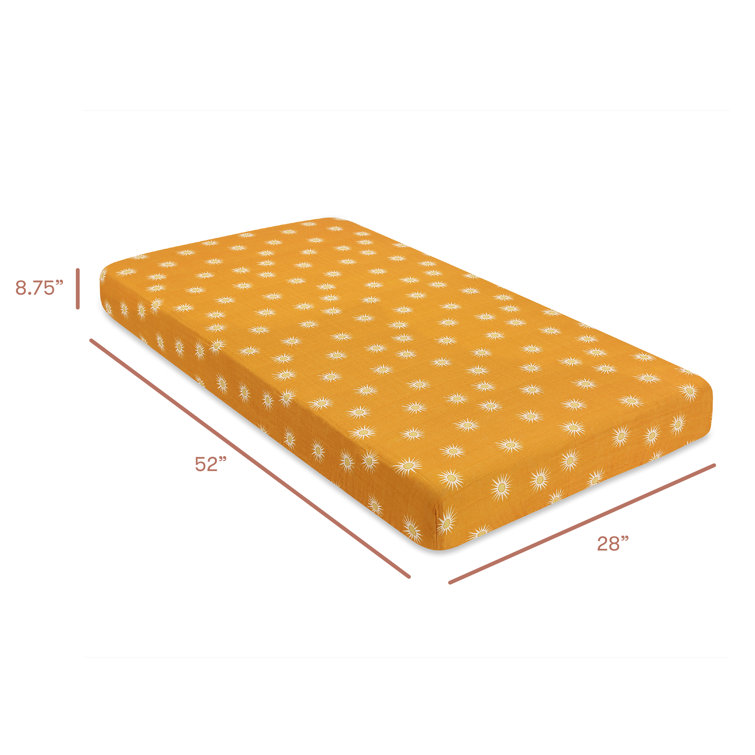 Golden Hour Organic Cotton Toddler Crib Sheet with Sunburst Pattern