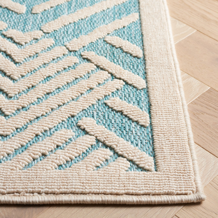 Ivory and Turquoise Geometric 5' x 7' Wool Area Rug