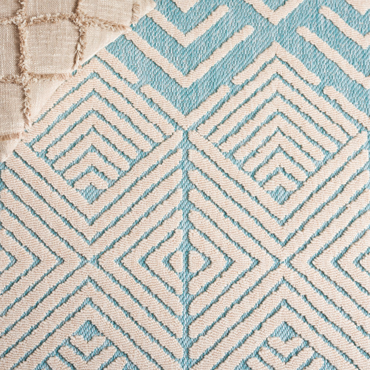 Ivory and Turquoise Geometric 5' x 7' Wool Area Rug