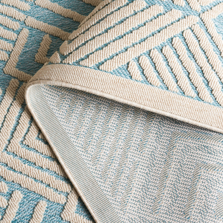 Ivory and Turquoise Geometric 5' x 7' Wool Area Rug