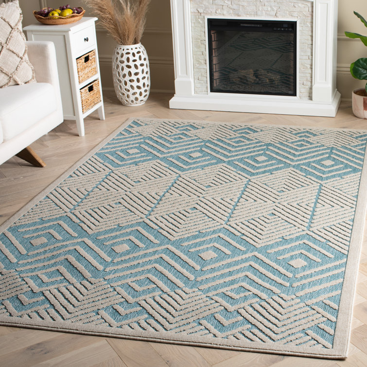 Ivory and Turquoise Geometric 5' x 7' Wool Area Rug