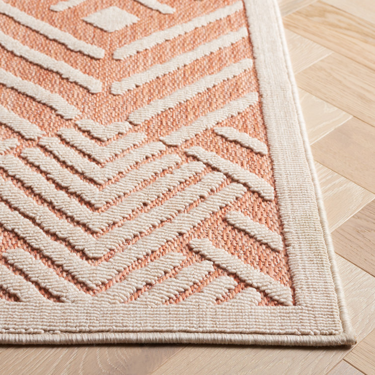 Ivory and Rust Geometric 5' x 7' Stain-resistant Rug