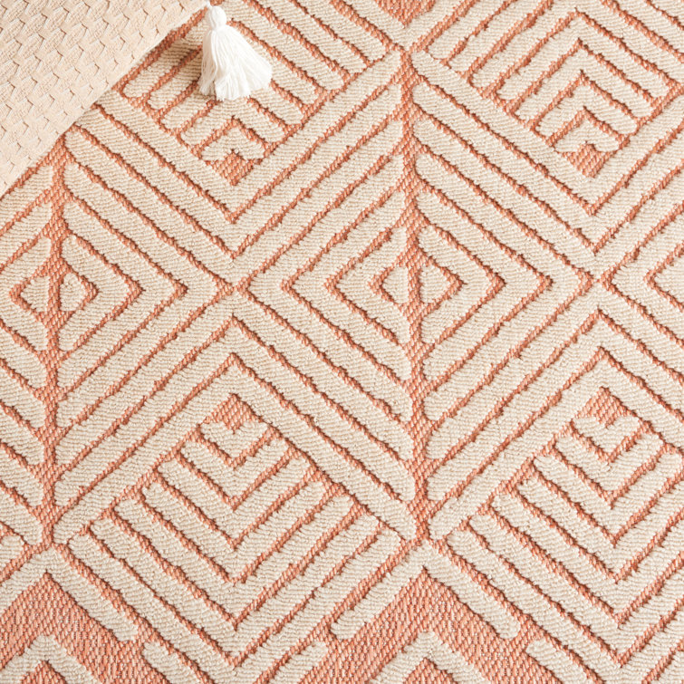 Ivory and Rust Geometric 5' x 7' Stain-resistant Rug