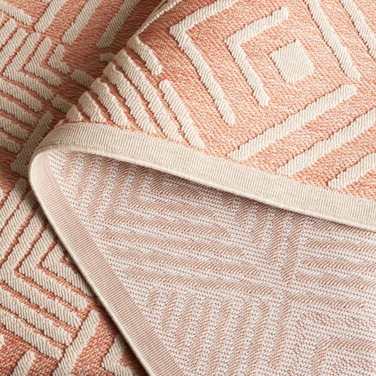 Ivory and Rust Geometric 5' x 7' Stain-resistant Rug