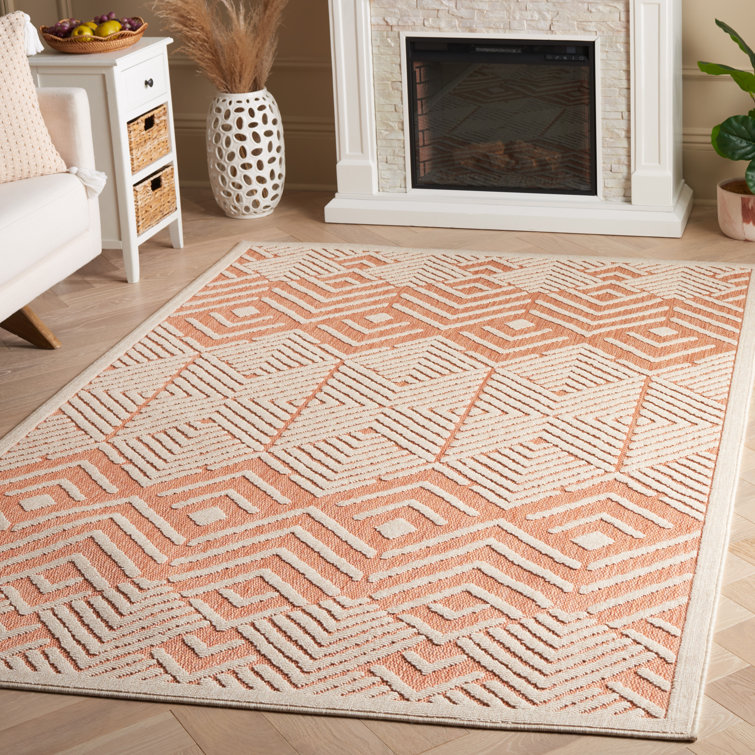 Ivory and Rust Geometric 5' x 7' Stain-resistant Rug