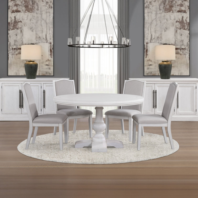 Antique White 54" Round Pedestal Dining Set with Upholstered Chairs
