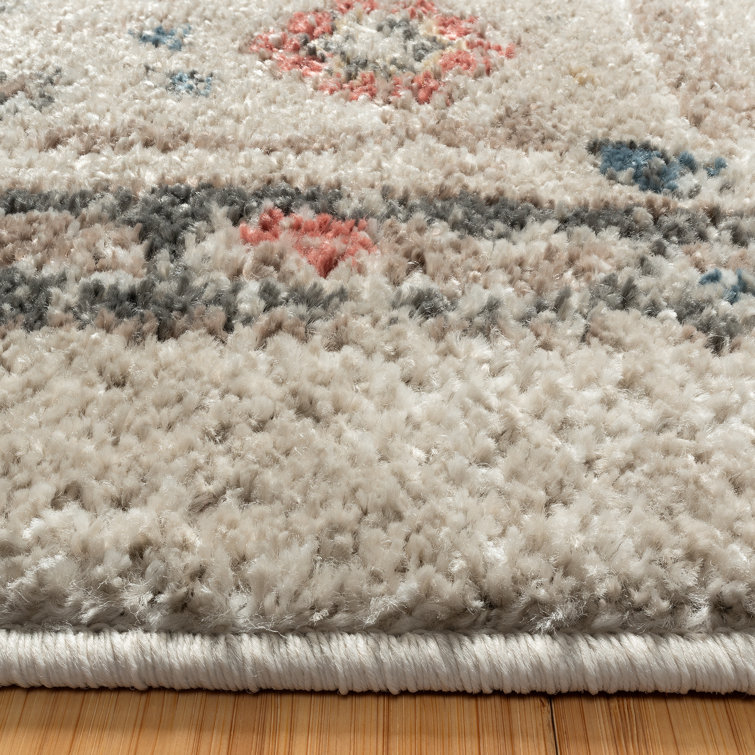 Ivory Tufted Rectangular 8' x 10' Synthetic Area Rug