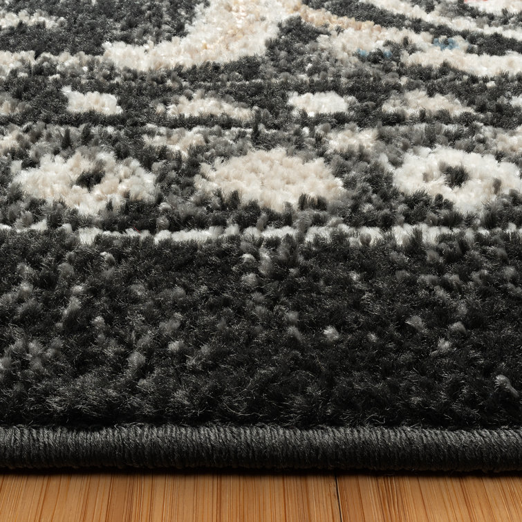 Heirloom Black and Beige Tufted 8' x 10' Synthetic Area Rug