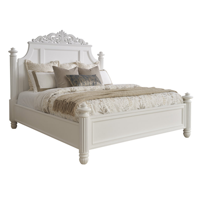 White King Upholstered Poster Bed with Carved Headboard
