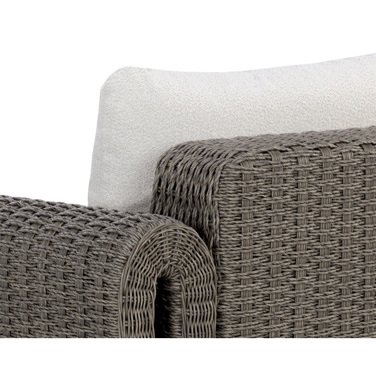 Gray Wicker Lounge Chair with Cream Cushions