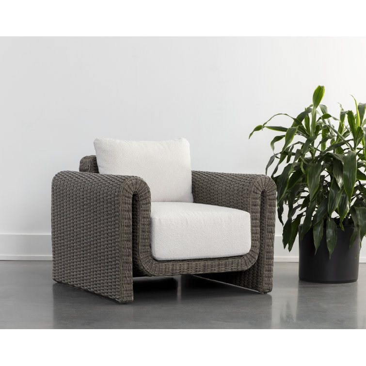 Gray Wicker Lounge Chair with Cream Cushions