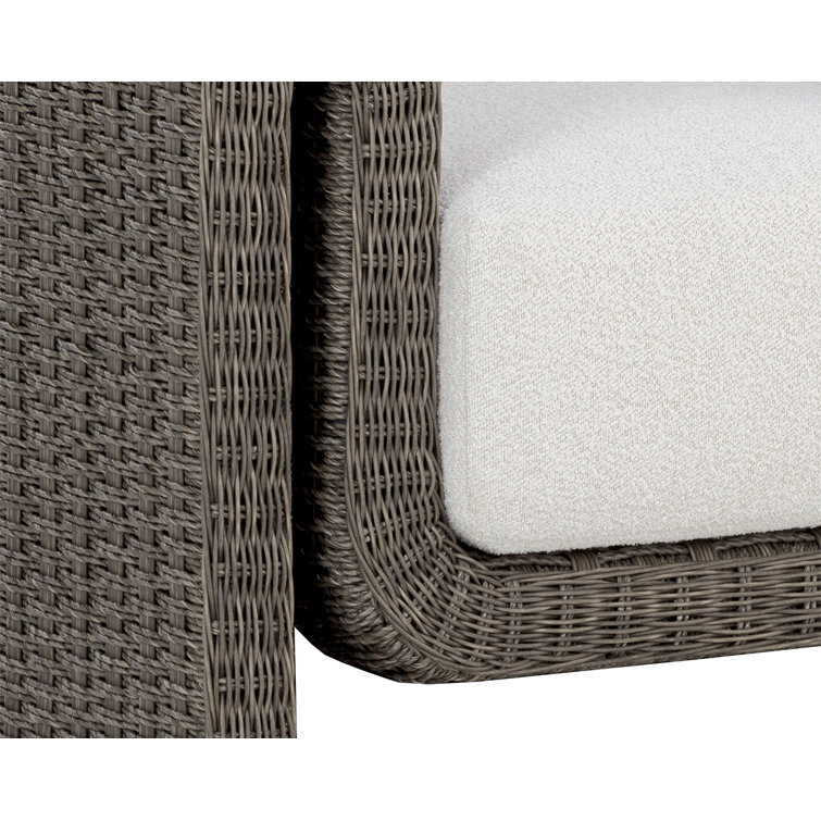Gray Wicker Lounge Chair with Cream Cushions