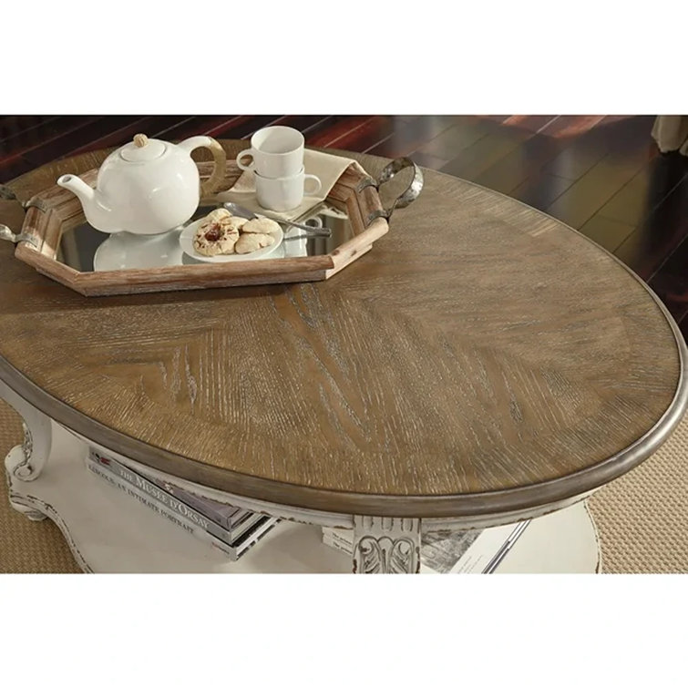 Antiqued Two-Tone Oval Wood Coffee Table with Cabriole Legs