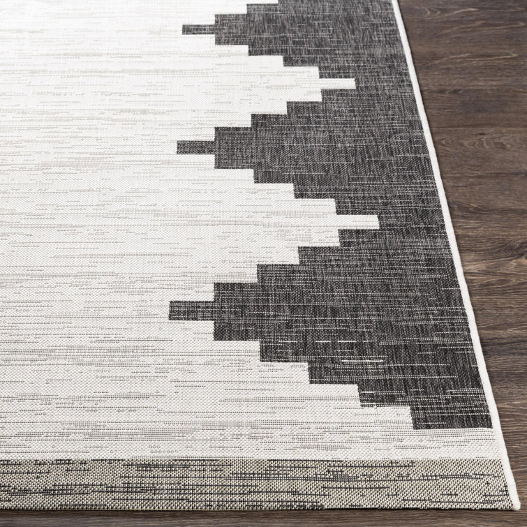 Black and Ivory Rectangular Braided Synthetic Rug