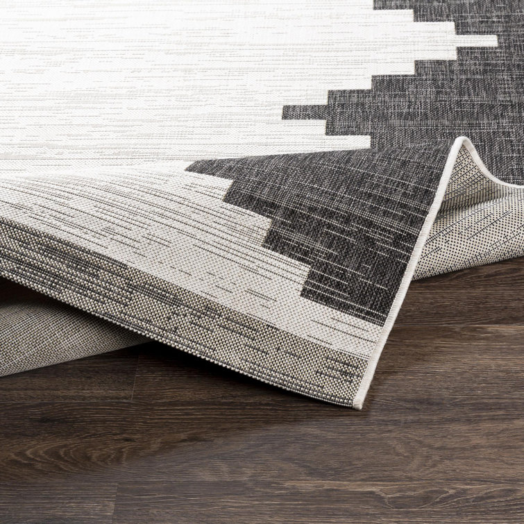 Black and Ivory Rectangular Braided Synthetic Rug