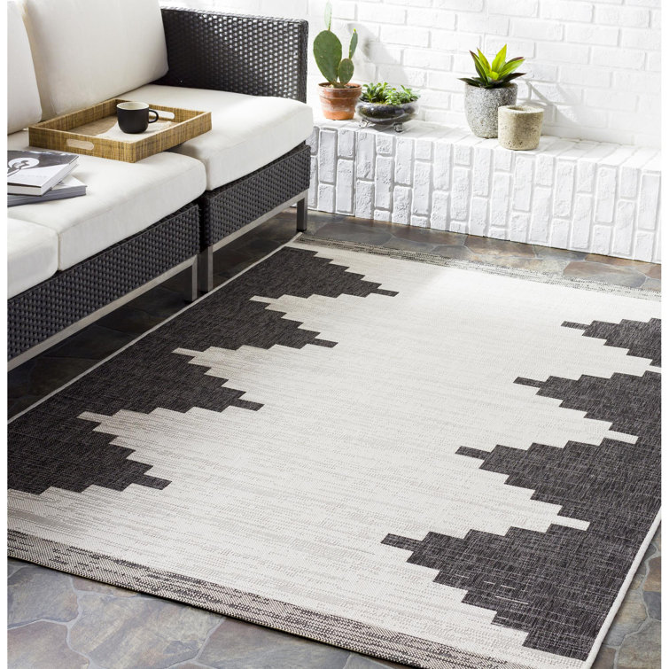 Black and Ivory Rectangular Braided Synthetic Rug