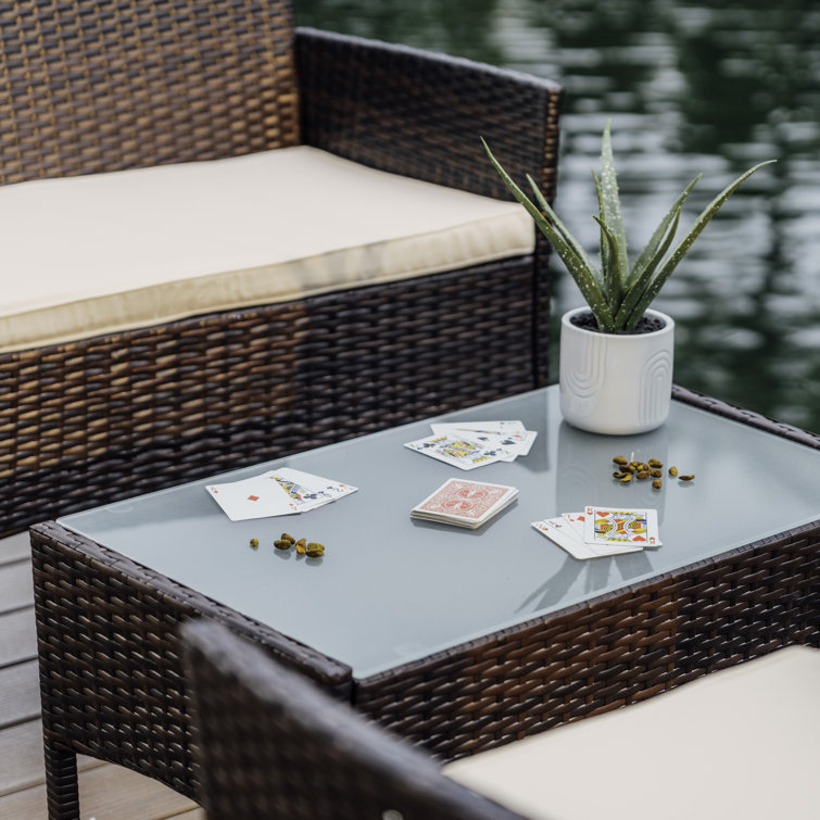 4-Piece Brown Wicker Outdoor Seating Set with Beige Cushions
