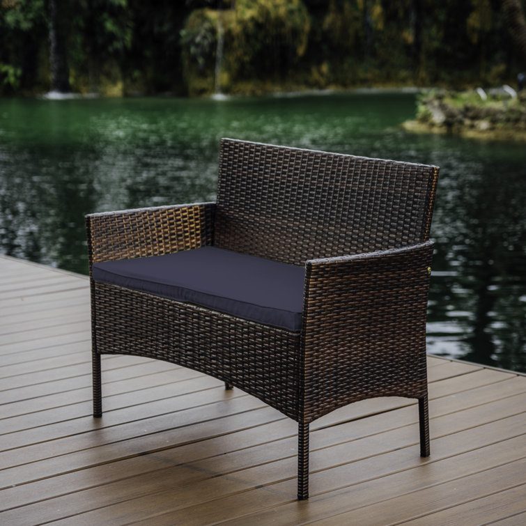 4-Piece Brown Wicker Outdoor Seating Set with Blue Cushions
