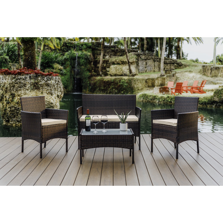4-Piece Brown Wicker Outdoor Seating Set with Beige Cushions