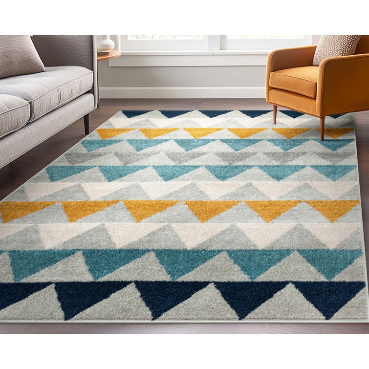 Ivory and Multicolor Geometric Synthetic 8' x 10' Area Rug
