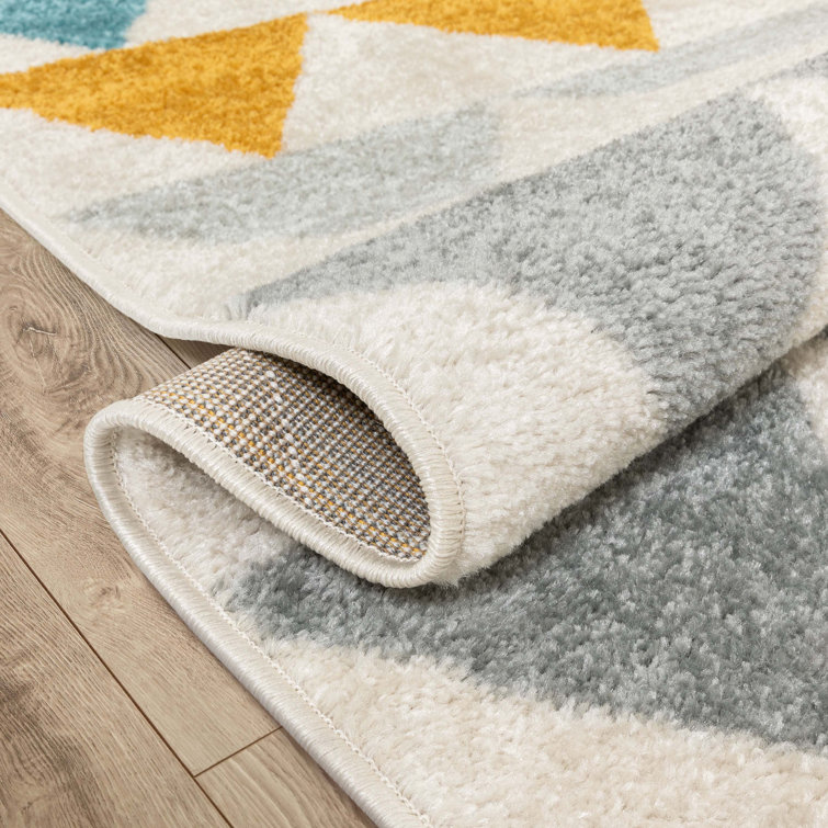 Ivory and Multicolor Geometric Synthetic 8' x 10' Area Rug