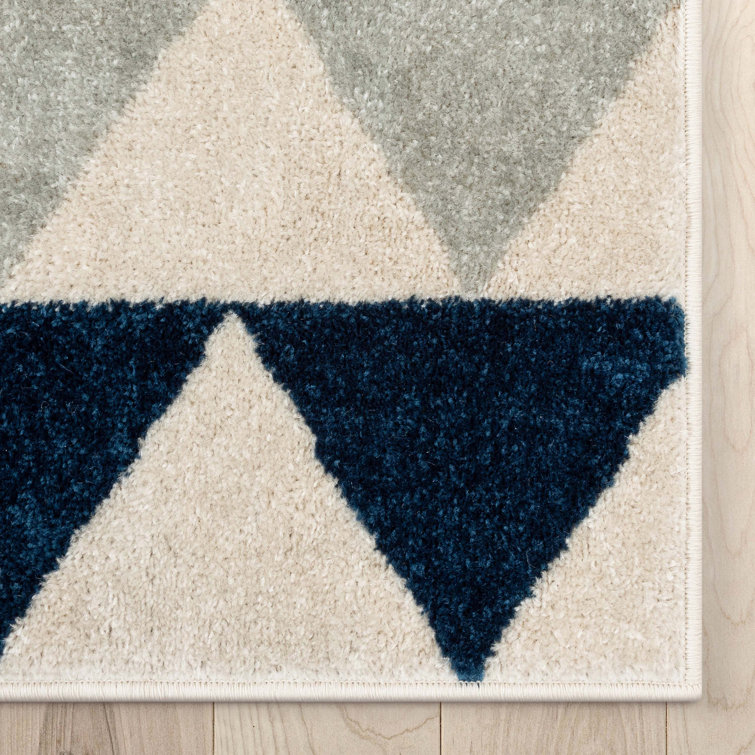 Ivory and Multicolor Geometric Synthetic 8' x 10' Area Rug