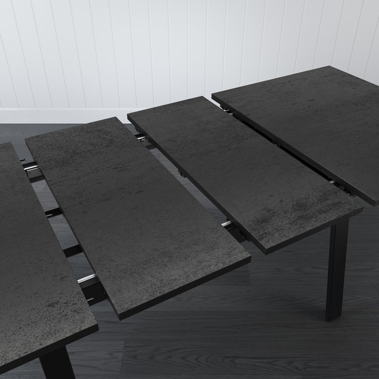 Reaves Black Laminate Dining Table with Silver Gray Chairs