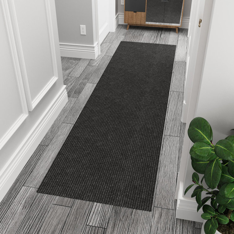 Modern Utility Black Synthetic 31x118 Ribbed Indoor/Outdoor Runner Rug