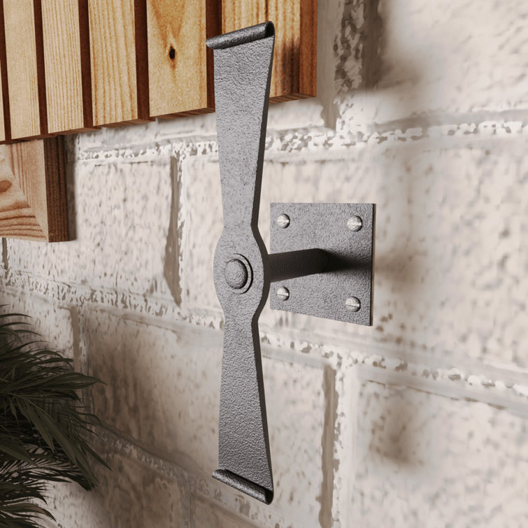 Black Wrought Iron Propeller Shaped Shutter Dog Holders