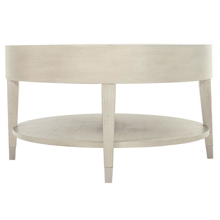 Transitional Cream Oval Coffee Table with Metal Accents and Storage