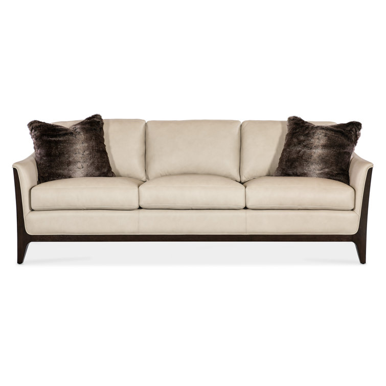 Beige Leather Reclining Sleeper Sofa with Ottoman