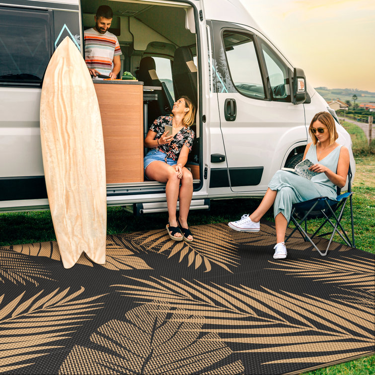 Black and Beige 6' x 9' Reversible Synthetic Outdoor Rug