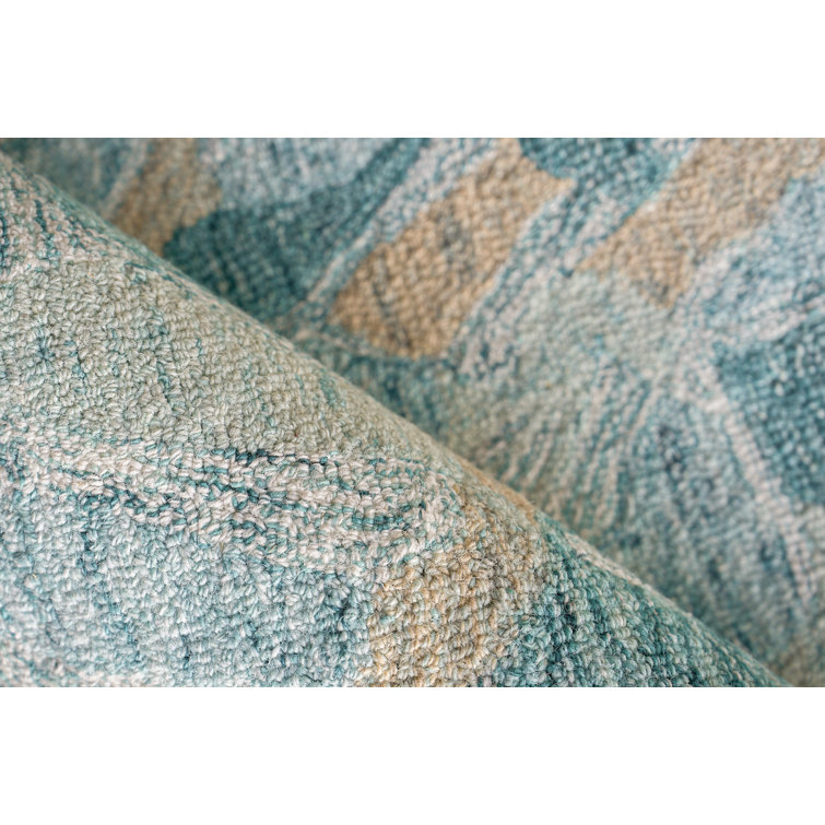 Handmade Turquoise and Ivory Wool Rectangular Area Rug