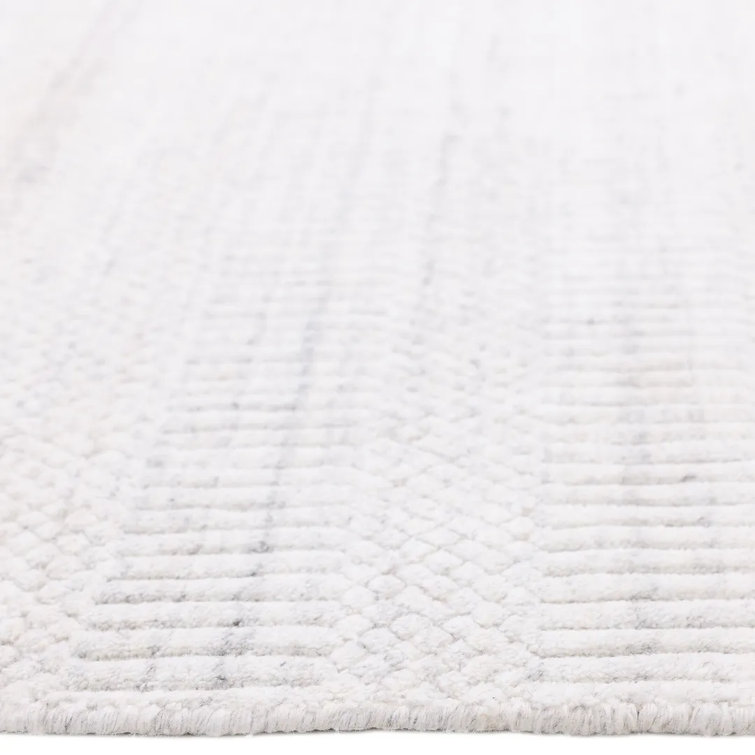 Handmade Ivory Wool and Viscose 9' x 12' Area Rug