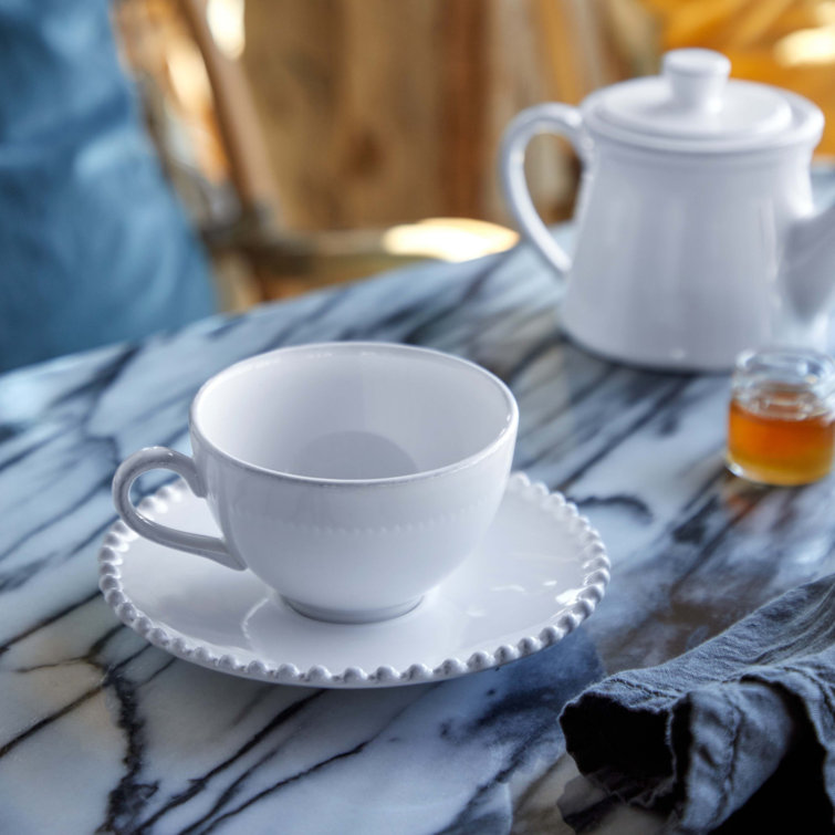 White Ceramic Tea Cup and Saucer Set
