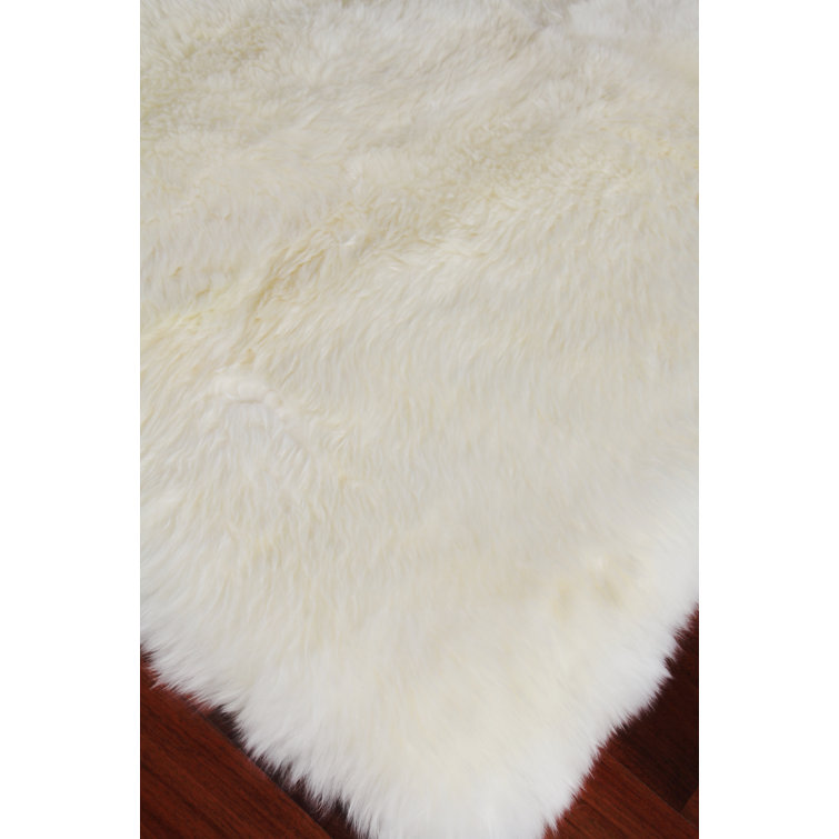 Handmade Ivory Sheepskin Rectangular Rug with Cotton Backing