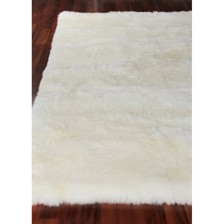 Handmade Ivory Sheepskin Rectangular Rug with Cotton Backing