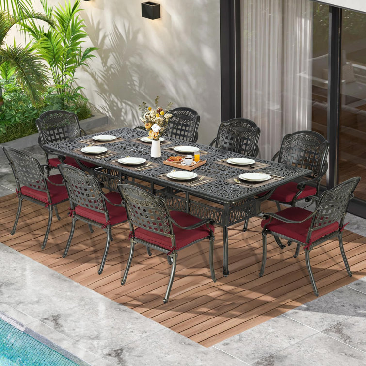 Antique Bronze 9-Piece Cast Aluminum Patio Dining Set with Red Cushions