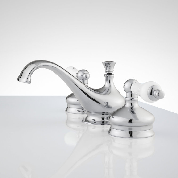 Chrome Widespread Bathroom Faucet with Porcelain Handles