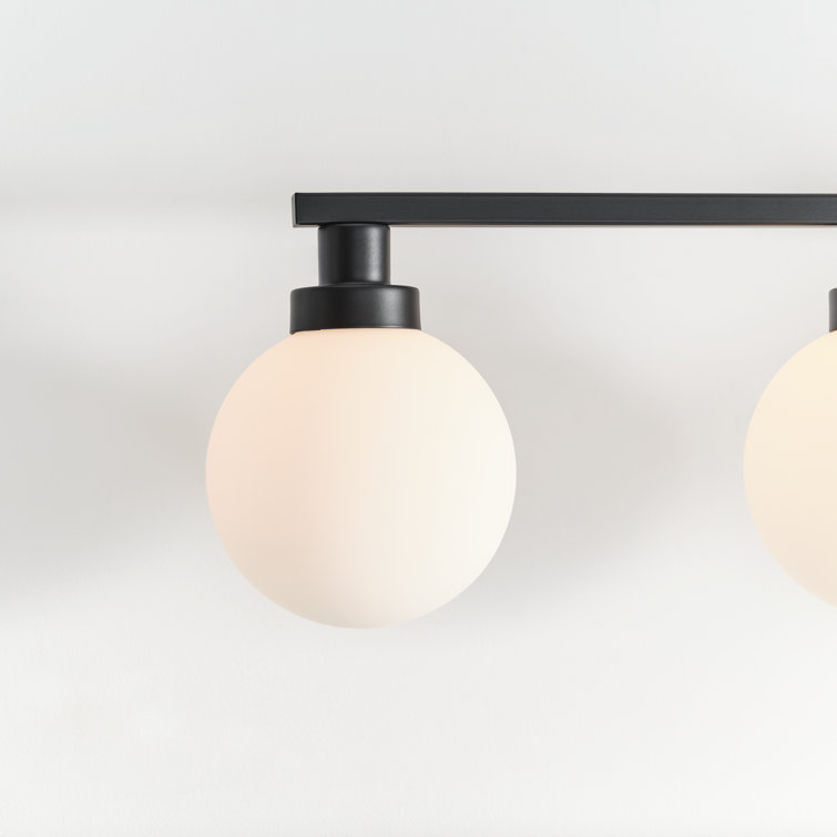 Midnight Black 4-Light Globe Vanity Fixture with Frosted Shades