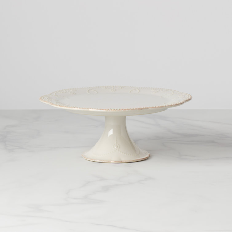 Elegant White Ceramic Pedestal Cake Stand with Floral Motif